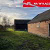 Drewniany dom na działce w Świeciechowie Dużym.