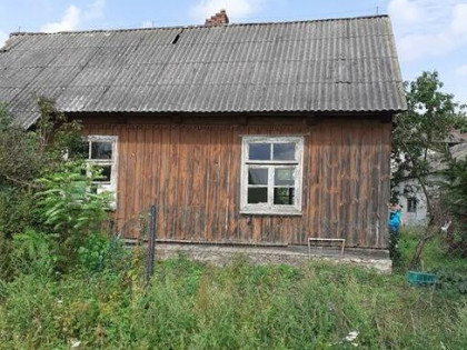 sprzedam dom drewniany z dużą działką
