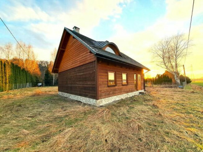 Letniskowy dom drewniany w Załużu 140 mkw na działce 8,64 ar