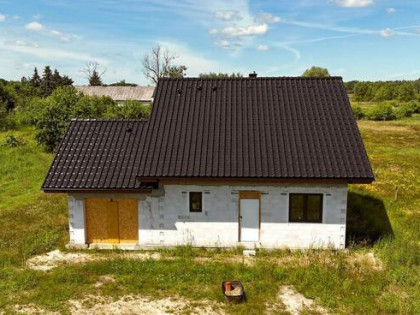 Mały dom w Białuniu na dużej działce