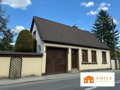 Atrakcyjny dom rodzinny plus mieszkanie wakacyjne w niskiej