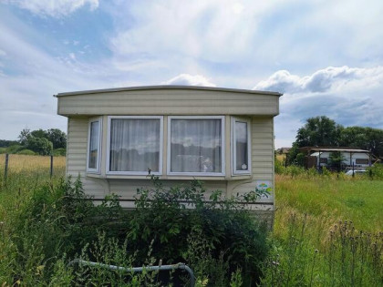 Działka rekreacyjna z domkiem holenderskim i WZ, Głodowo