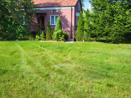 Dom z działką  i dwoma budynkami gospodarczymi w okolicy Rancza Wilkowyje