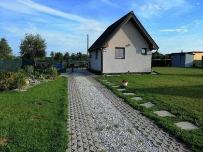 Całoroczny domek w Darłowie – 800 m² działki, 100 m od rzeki