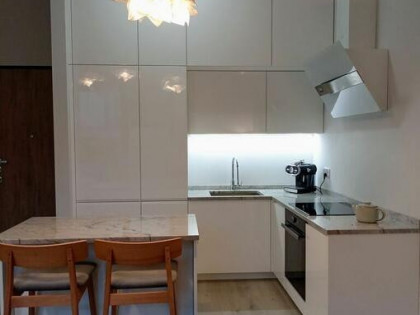 Unikatowe wysokie mieszkanie 43,7 m² z ogrodem