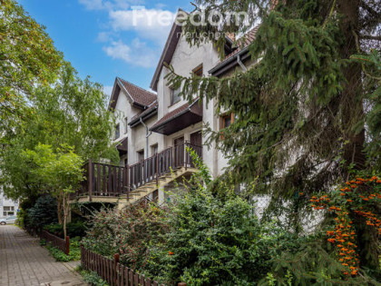 Klimatyczne mieszkanie w zabudowie szeregowej