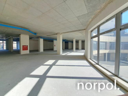 Lokal usługowo-handlowo-biurowy w reprezentacyjnym apartamentowcu, os. Ruczaj