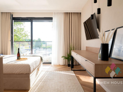 Apartament na Szlaku Wielkich Jezior z ogródkiem