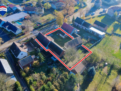 Dom z warsztatem, stodołą i oborą