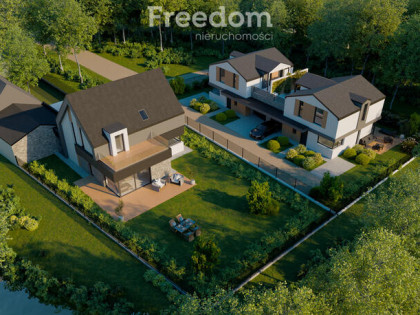 Domy Nad Potokiem w Żukczynie