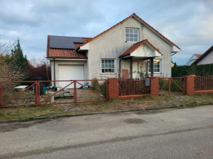 Syndyk sprzeda udział ½ w nieruchomości zabudowanej domem