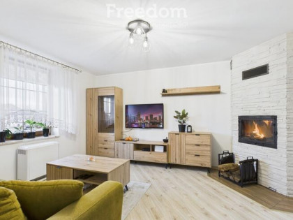 Mieszkanie z ogrodem, garażem i kominkiem
