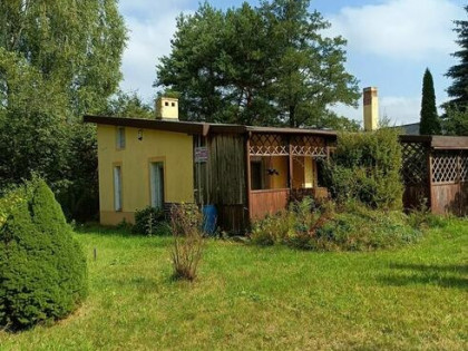 Działka 1306m2 nad rzęką z domkiem 50m2