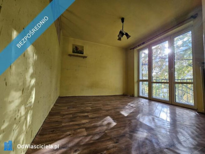 Przestronna kawalerka 37 m² z widokiem na park, w cichym bloku z cegły.