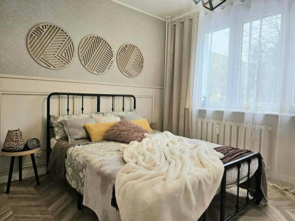 Mieszkanie trzypokojowe na parterze z balkonem