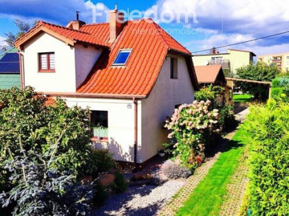 Dom z ogrodem w centrum miasta