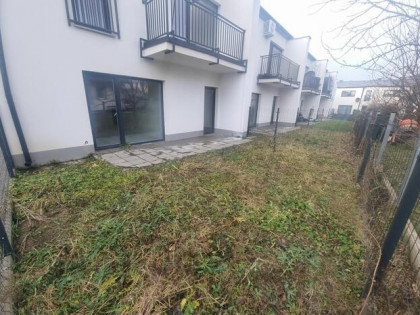 Mieszkanie w szeregowcu z ogródkiem i 2 miejscami postojowym