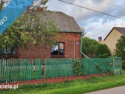 Dom z cegły z dużą działką + budynki gospodarcze