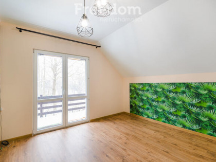 Połowa domu z działką w świetnej cenie