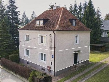 Bezczynszowe mieszkanie z ogrodem i dwoma garażami