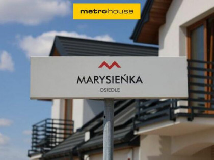 Połowa bliźniaka z garażem - stan surowy otwarty