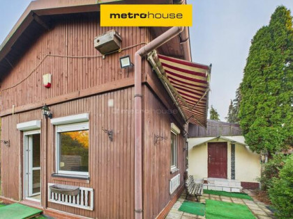 Kalina,Herby mały dom na działce przy lesie