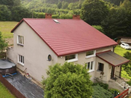 Dom w otulinie lasów - udział w nieruchomości 1/2