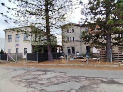 USTROŃ centrum Zabudowana działka 0,5ha + budynki 2650m2