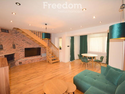 Dwupoziomowe mieszkanie z kominkiem – Gliwice