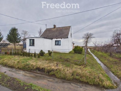 Dom z potencjałem i dużą działką.