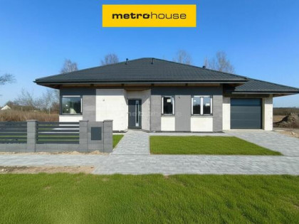 Dom parterowy wolnostojący - pompa ciepła, kominek