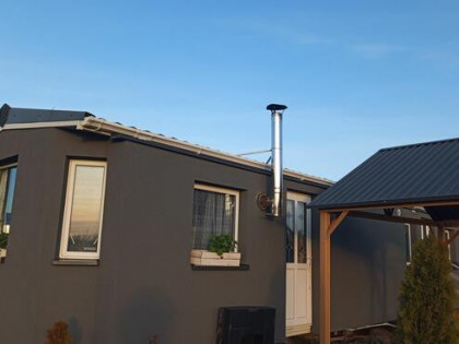 Sprzedam działkę widokową z domkiem całorocznym .