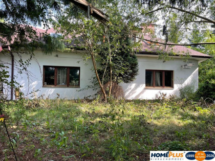 Dom do remontu z garażem i dużą działką