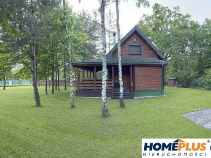 Drewniany dom letniskowy w Arciechowie, 70 m²