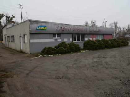 Nieruchomość gruntowa zabudowana budynkiem handlowo-usługowy