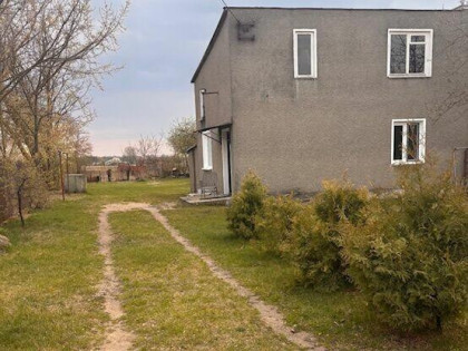 Dom z działką blisko Warszawy – teren ogrodzony
