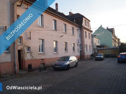 Syndyk sprzeda udział 1/2 w nieruchomości lokalowej - ul. Szkolna 2, Żmigród - 75%