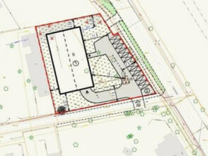 Działka budowlana 1635 m² z asfaltem i ogrodzeniem