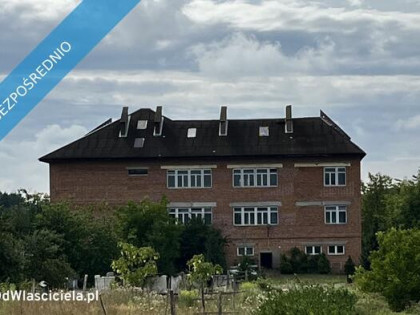 Budynek  1024m z działką 7600 m²