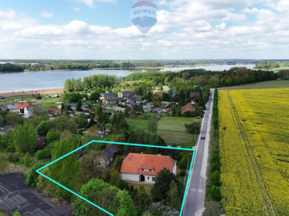 Działka zabudowana starą szkołą|jez.Niepruszewskie