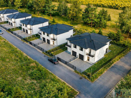 Nowoczesny dom z garażem w Nowych Iganiach | 162,6