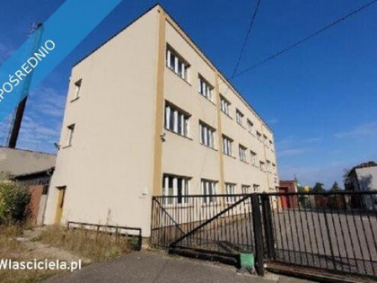 Działka zabudowana budynkami produkcyjno- magazynowymi