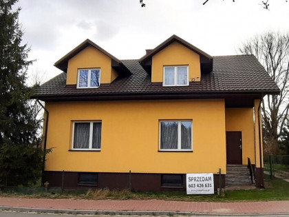 Dom z gospodarstwem