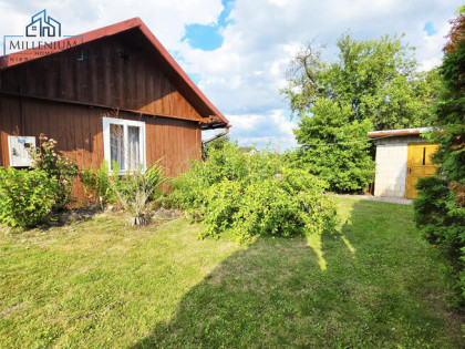 Drewniany dom z dostępem do rzeki | 16,47 ar |