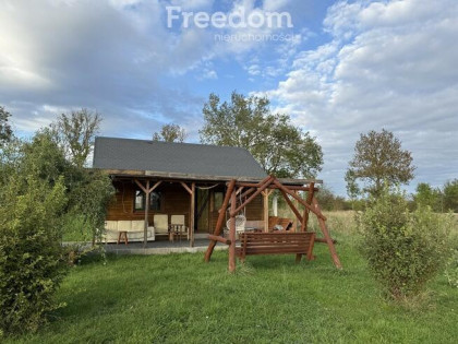 Działka 8454 m² z domkiem letniskowym i warunkami