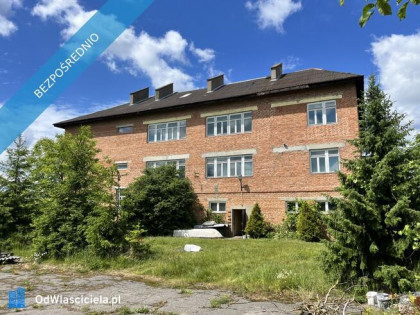 Budynek  1024m z działką 7600 m²