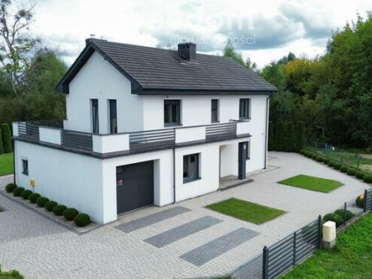 Dom wolnostojący 191 m², działka 945 m², garaż