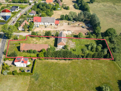 Dwa budynki magazynowo-produkcyjne + działka 6.496 m²