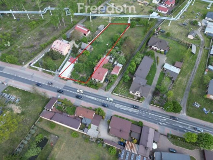 Działka z zabudowaniami
