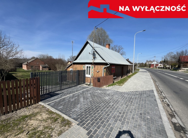 Drewniany dom na działce w Świeciechowie Dużym. Świeciechów Duży